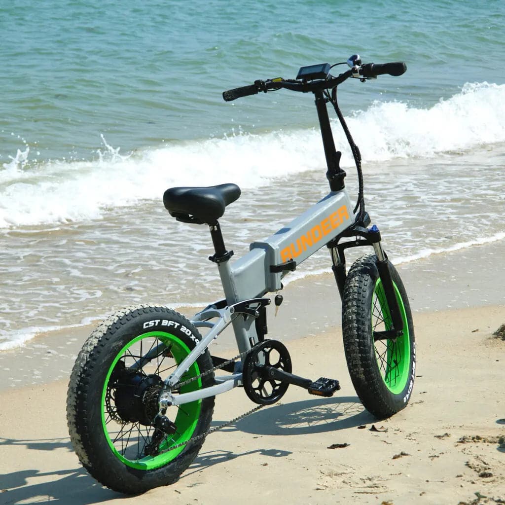 RUNDEER Hummer folding e-bike on beach with ocean background
