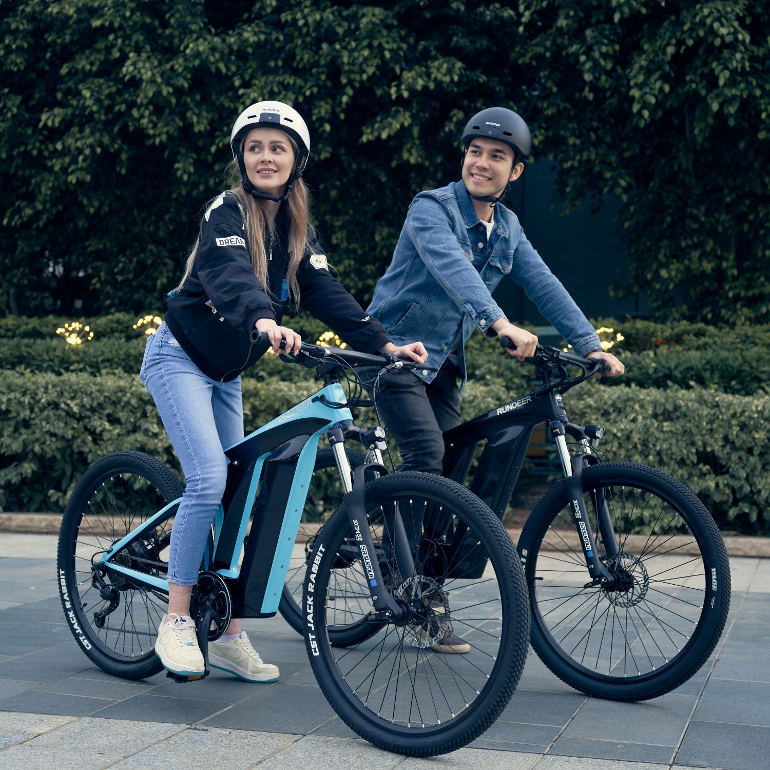 Couple riding Rundeer Starry Sky electric bikes